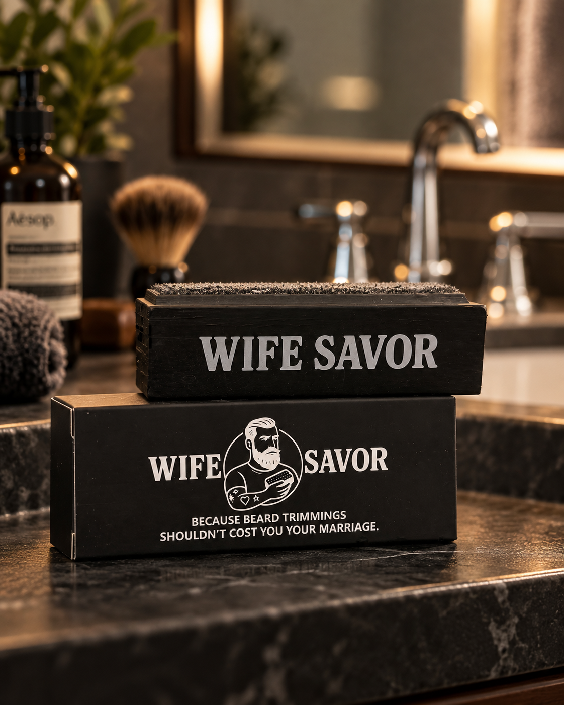 Wife Savor sponge and box on a polished bathroom counter with chrome faucet and shaving brush